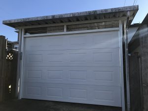 install garage door to a carport